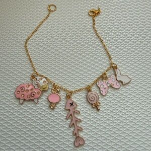 Charming Gold and Pink Charm Bracelet